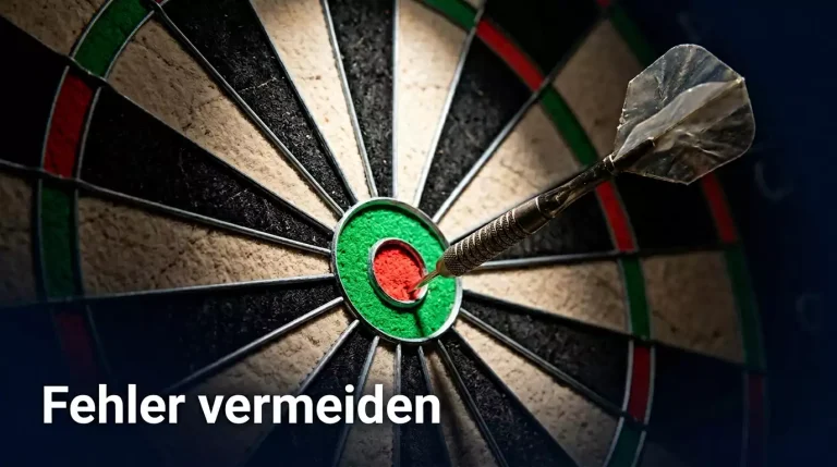 Dartpfeil der knapp am Bullseye vorbeifliegt als Symbol für Wettfehler